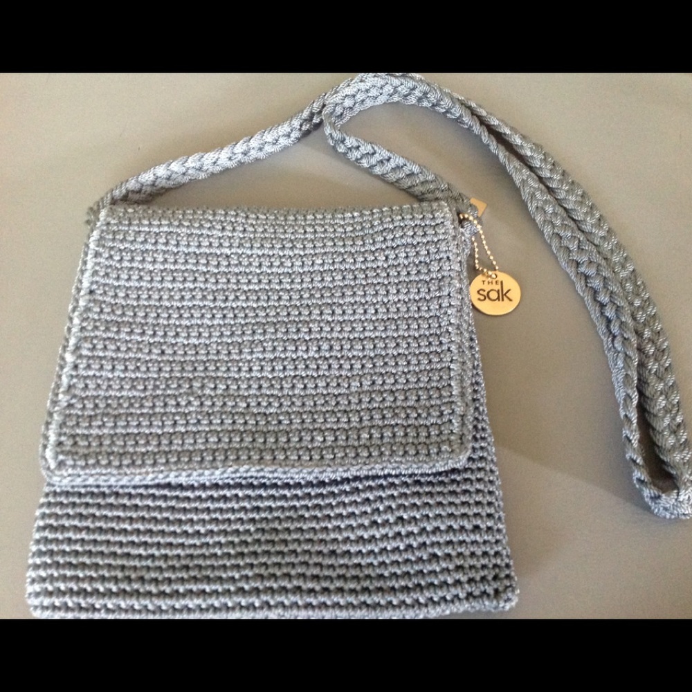 The Sak blue cross body small purse handbag